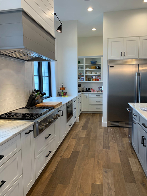 Hallmark Floors Novella Twain alt kitchen installation by McCulloughs Flooring