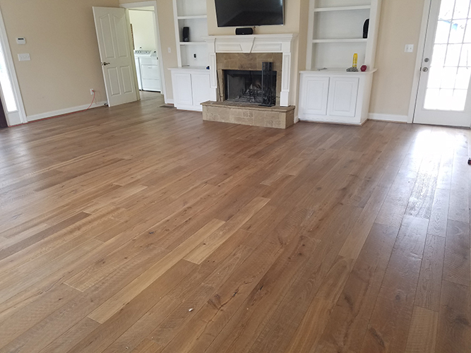 Hallmark Floors Organic 567 Gunpowder Oak installation by Carolina Hardwoods