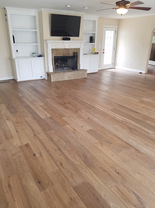 Hallmark Floors Organic engineered 567 Gunpowder Oak installation by Carolina Hardwoods