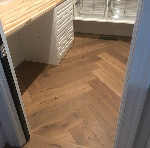 Hallmark Floors herringbone install by Greer Flooring Center